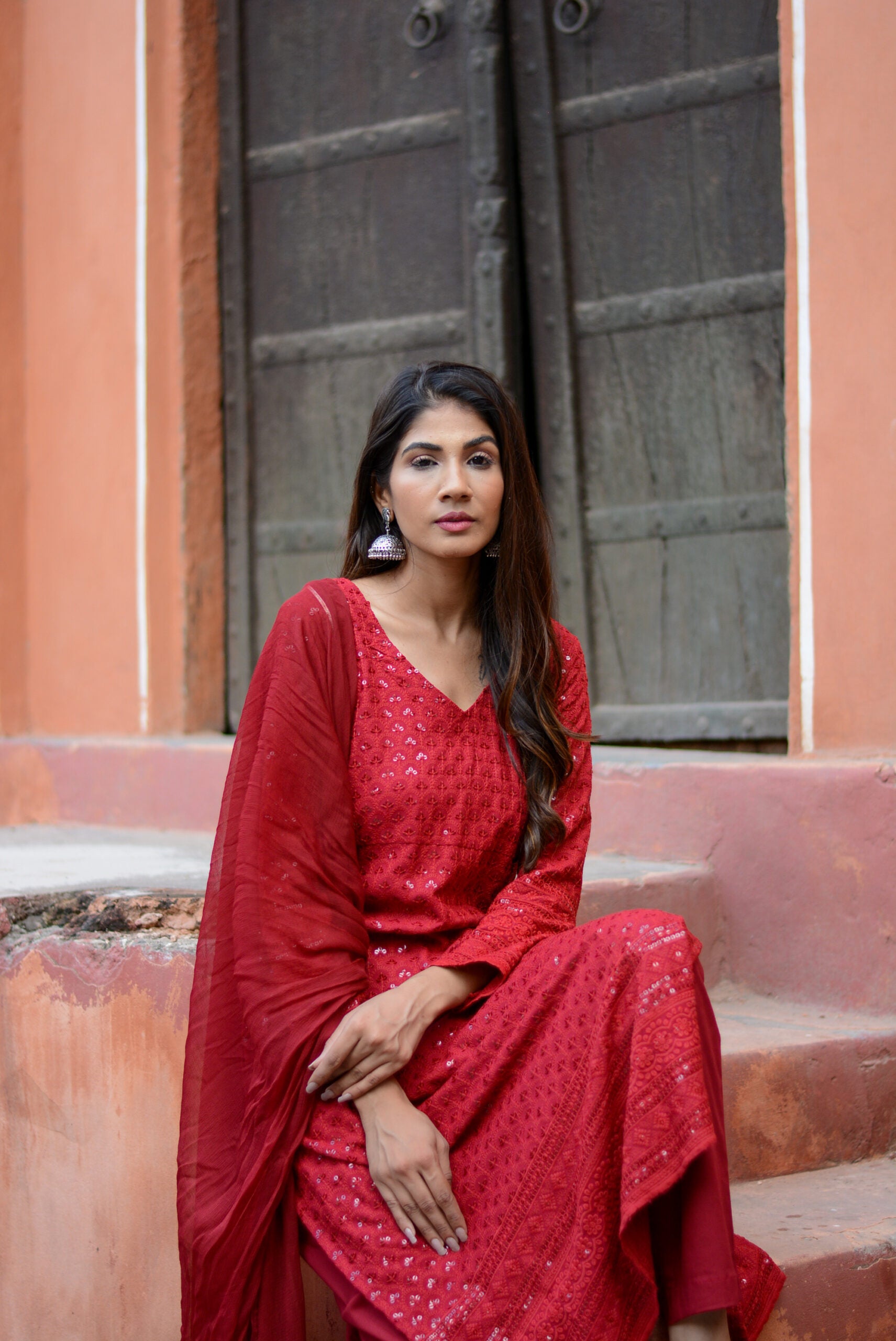 Carmine red chikankari three piece suit set